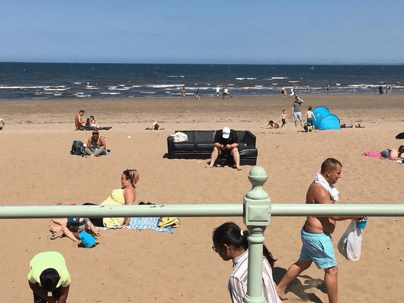 A group of people on a beach
Description automatically generated with medium confidence