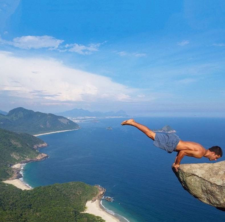 A person jumping off a cliff
Description automatically generated with low confidence